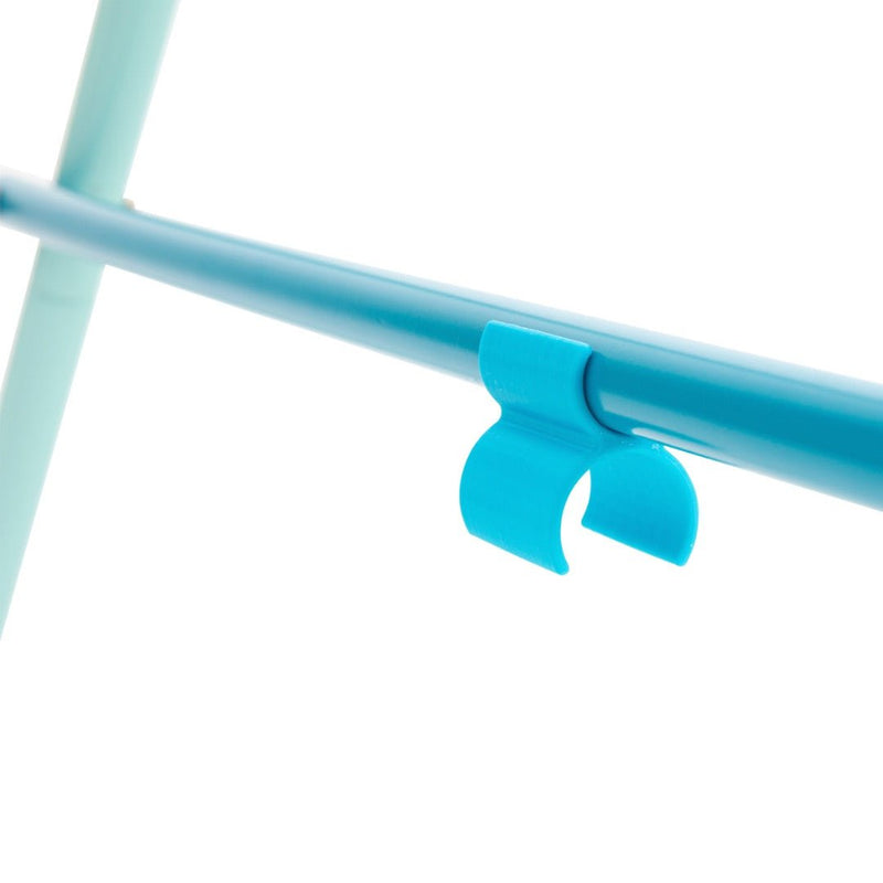 Close-up of a blue plastic clip attached to a cylindrical rod on the TP Foldaway Baby Swing by TP Toys, with another rod visible in the background, all set against a white backdrop.