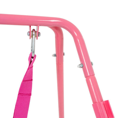 Close-up of the TP Pink Foldaway Baby Swing by TP Toys, showing its pink metal frame, a pink strap attached with a metal hook, and bolts visible at the joints.