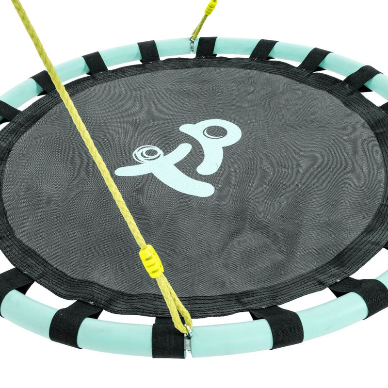 Close-up of a round TP Toys Giant Nest Swing in black and teal with yellow ropes attached; a white smiling face decorates the seat. Part of the TP Giant Nest Metal Swing Set.
