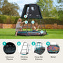 Two children play on the TP Toys Build Your Own TP Explorer Metal Climbing Frame Black Edition, which features a tent top, climbing ladders, a cargo net entrance, an adventure playmat, and a ball pit in a grassy yard.