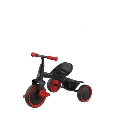 The TP Toys Zoomee 2 in 1 Trike – Firecracker features a black and red design with three wheels, a bucket seat, and red pedals—ideal as a first trike for young riders.