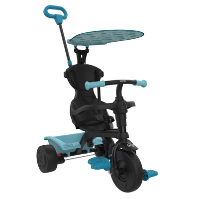 The TP Toys Zoomee 4 in 1 Trike - Dino Discovery is a black and blue trike with an adjustable UV sunshade, push handle, footrests, and a rear storage basket.