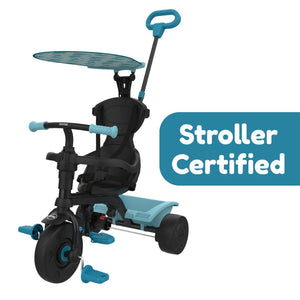 The Zoomee 4 in 1 Trike - Dino Discovery by TP Toys features black and blue colors, a sunshade, push handle, footrests, and a fun dinosaur print. Shown with the text "Stroller Certified.