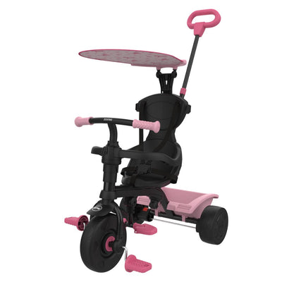 The TP Toys Zoomee 4 in 1 Trike - Unicorn Dream is a pink and black childrens trike with unicorn print, adjustable UV sunshade, rear push handle, footrests, and a supportive seat with backrest.