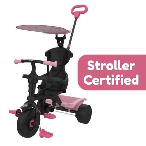 The Zoomee 4 in 1 Trike - Unicorn Dream by TP Toys features black and pink colors, sunshade, handlebar, footrests, and a “Stroller Certified” label—ideal as your child’s first unicorn trike!.
