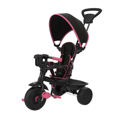 The TP Toys Zoomee 4 in 1 Deluxe Trike - Pink Dusk is a children’s tricycle with a sunshade, parent handle, footrests, and safety harness in black and pink.