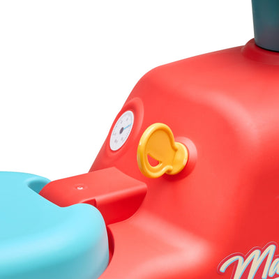 Close-up of the Falk Maurice Vintage Baby Red Tractor by TP Toys, a recycled red and blue ride-on with a yellow walker bar and white gauge—perfect for little ones learning to walk.