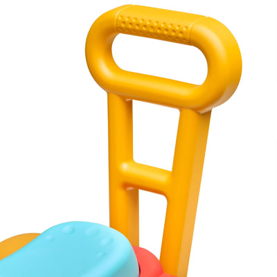 Close-up of the yellow walking aid bar on the Falk Maurice Vintage Baby Red Tractor by TP Toys, with part of the blue seat visible—an ideal pick for little ones learning to walk.