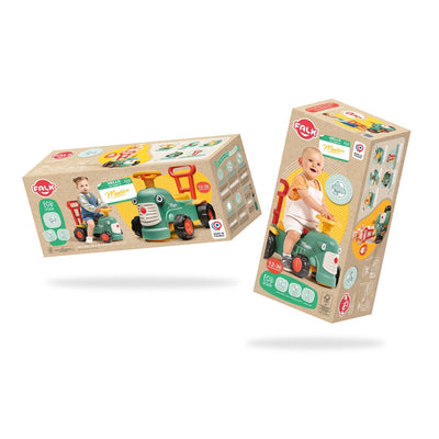 Two boxes of the TP Toys Falk Maurice Vintage Baby Green Tractor show babies learning to walk using the aid bar; packaging features product info, brand logo, and highlights the tractor’s recycled plastic design.