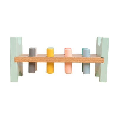The TP Toys Owl & Fox Wooden Hammer Bench - FSC® certified features a pastel rack with six cylindrical pegs, designed to develop hand-eye coordination and inspire creative play.