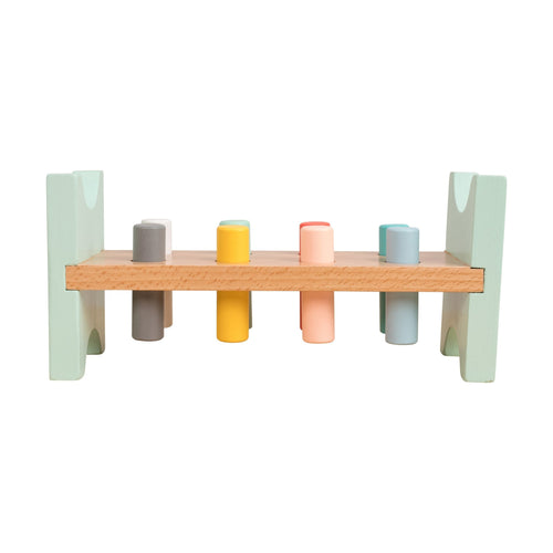 The TP Toys Owl & Fox Wooden Hammer Bench - FSC® certified features a pastel rack with six cylindrical pegs, designed to develop hand-eye coordination and inspire creative play.