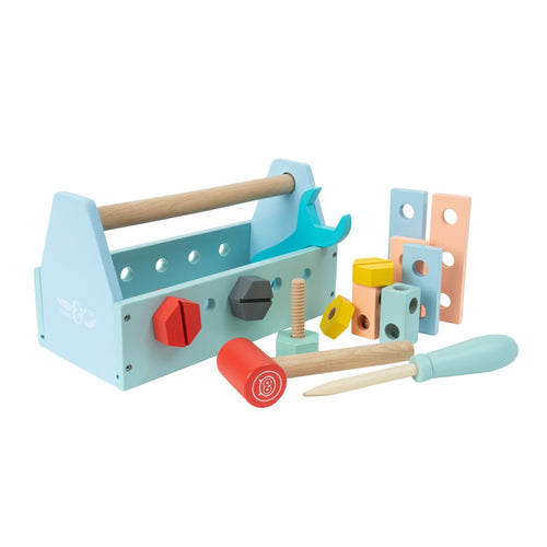 The TP Toys Owl & Fox Wooden Tool Caddy - FSC® certified includes a hammer, screwdriver, wrench, nuts, bolts, and colorful blocks for imaginative play, all neatly arranged beside a light blue caddy.