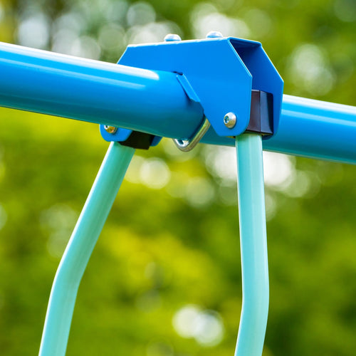 Close-up of the TP Metal Swing Slide & Glide frame by TP Toys, featuring blue metal connecting joints, set against a blurred green garden background.
