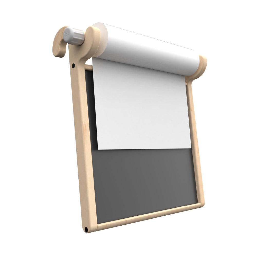 The TP Active-Tots Pikler Style Wooden Easel Play Accessory by TP Toys is a wall-mounted, FSC® certified kids easel featuring a white paper roll above a black chalkboard, offering both chalkboard and paper scroll for creative play.