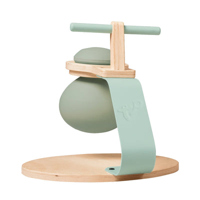 The TP Active-Tots Pikler Style Toddler Bouncer by TP Toys features a modern, minimalist wooden and pastel green design with a rounded base—an ideal addition to your nursery bouncer setup. FSC® certified for sustainability.