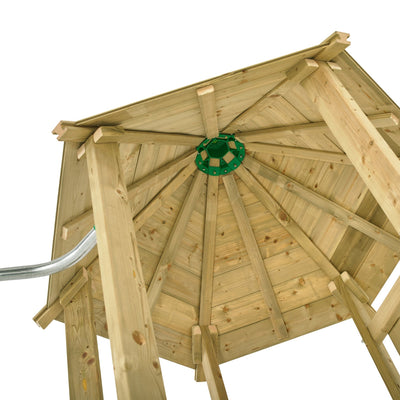 View of the Castlewood climbing frame by TP Toys, showing its exposed wooden beams and central green metal connector, supported by sturdy posts—part of a design featuring a Double Wooden Swing Arm and 1.8m Wavy Slide, FSC® certified.
