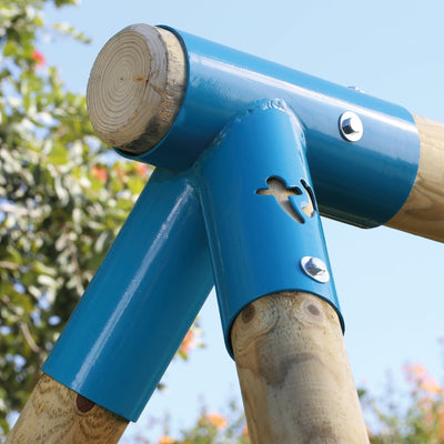 Close-up of the TP Toys TP Robin Swing and 6ft Slide Set: three sturdy wooden poles join at a blue metal cap with bolts, seen against a clear sky and leafy garden playframe background.
