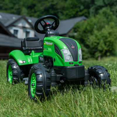 The TP Toys Falk Country Farmer Pedal Tractor with Trailer features a customisable number plate and is perfect for fun outdoor play in grassy areas.