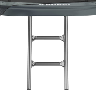 A close-up of a metal ladder attached to the frame of a TP Toys 10ft Akrobat Fenix Trampoline with a perforated jumping mat, set against a white background.