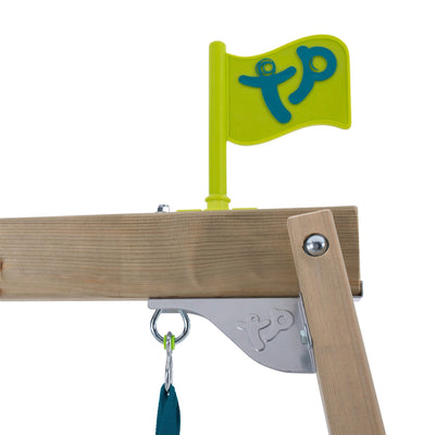Close-up of the TP Forest Multiplay Single Wooden Swing Set by TP Toys, showing a yellow flag with a blue tp logo, sturdy metal bracket, and part of the compact FSC® certified frame with room for the roped Rapide seat and slide.