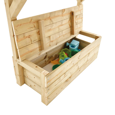 The TP Treetops Wooden Tower Playhouse with Toy Box by TP Toys features an FSC® certified wooden storage bench with an open lid, ideal for organizing colorful plastic toys in your garden playhouse.