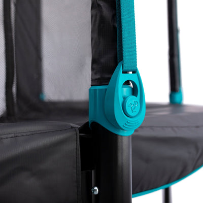 Close-up of the TP Toys Infinity 10ft x 14ft Rectangular Trampolines zip-free safety enclosure, featuring a teal strap and clasp attached to the black frame and padded edge.