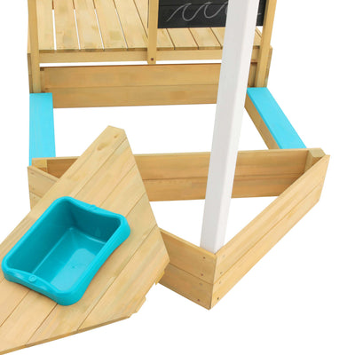 The TP Toys TP Ahoy Wooden Playboat with Dig & Explorer Accessory Kit (FSC® certified) features a triangular sandpit, white pole, aqua blue trim, and matching blue sand/water container to inspire imaginative play.