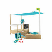 The TP Toys TP Ahoy Wooden Playboat with Dig & Explorer Accessory Kit features a ship design, blue canopy, steering wheel, chalkboard, toy accessories, and green flag—ideal for imaginative sand and water play. FSC® certified.
