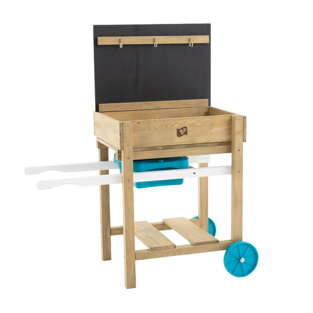The TP Toys TP Early Fun Sand and Water Table - FSC® certified features a blackboard back, two blue wheels, three hooks, storage compartment, and two white handles—ideal as an outdoor play table for imaginative kids’ activities.