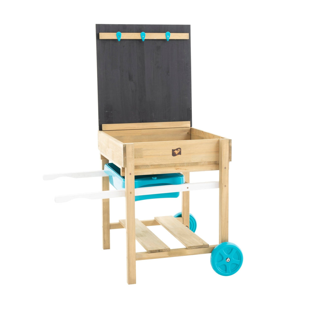 The TP Deluxe Sand and Water Table by TP Toys features a chalkboard back, blue hooks, pull-out drawer, blue wheels, white handles, and a built-in water tray—ideal for outdoor play or as a mini sand and water table. FSC® certified.