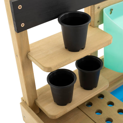 The TP Toys TP Wooden Explore Potting Bench - FSC® certified, with black cups, is ideal for organizing tools or setting up a childrens gardening station.