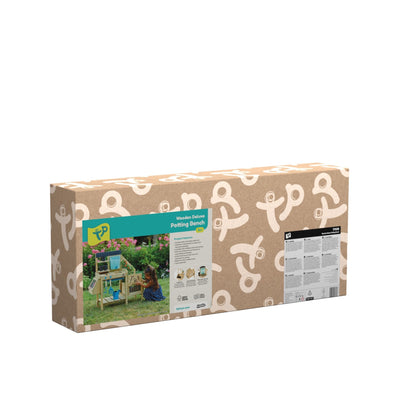 Rectangular box featuring TP Toys branding and details for the TP Wooden Deluxe Potting Bench - FSC® certified; displays images of the assembled bench, gardening features, and fun play accessories for a children’s garden station.