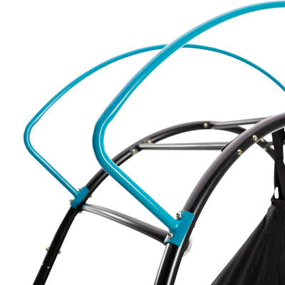 Close-up of a black and blue metal frame with bolts and fabric, part of the TP UFO Den & Climbing Frame by TP Toys.