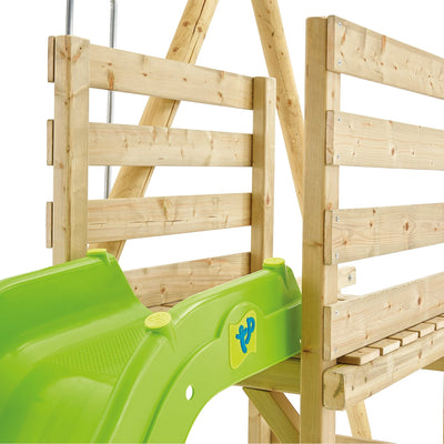 A close-up of the TP Toys TP Kite Wooden Double Swing Set features an 8ft slide attached to a wooden play structure with vertical slats, plus a Quadpod, Roped Rapide seat, and swings.