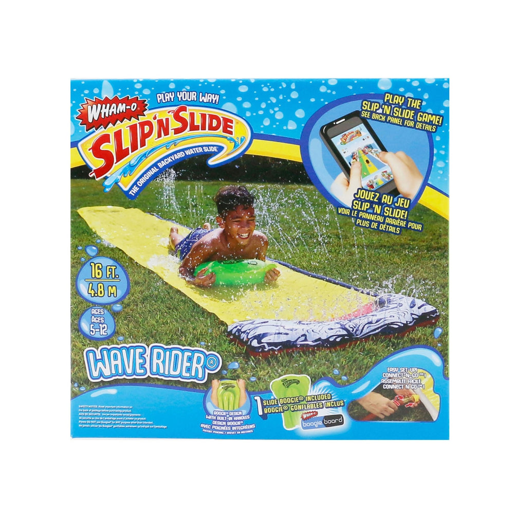 A child slides on the TP Toys Slip ‘n’ Slide Wave Rider Single, a yellow backyard water slide (up to 16 ft), shown with packaging highlighting features and game details. Suitable for ages 5–12.
